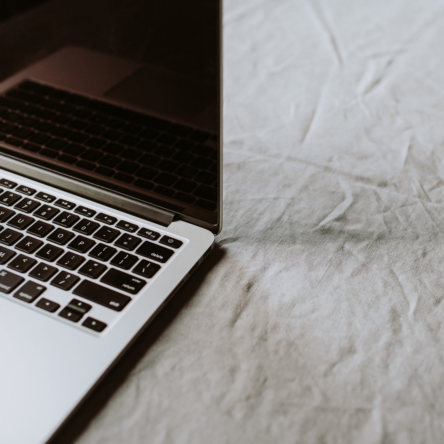 Laptop on a Linen Surface